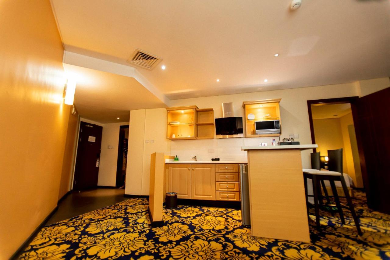 Suite met een Kingsize Bed en Kitchenette