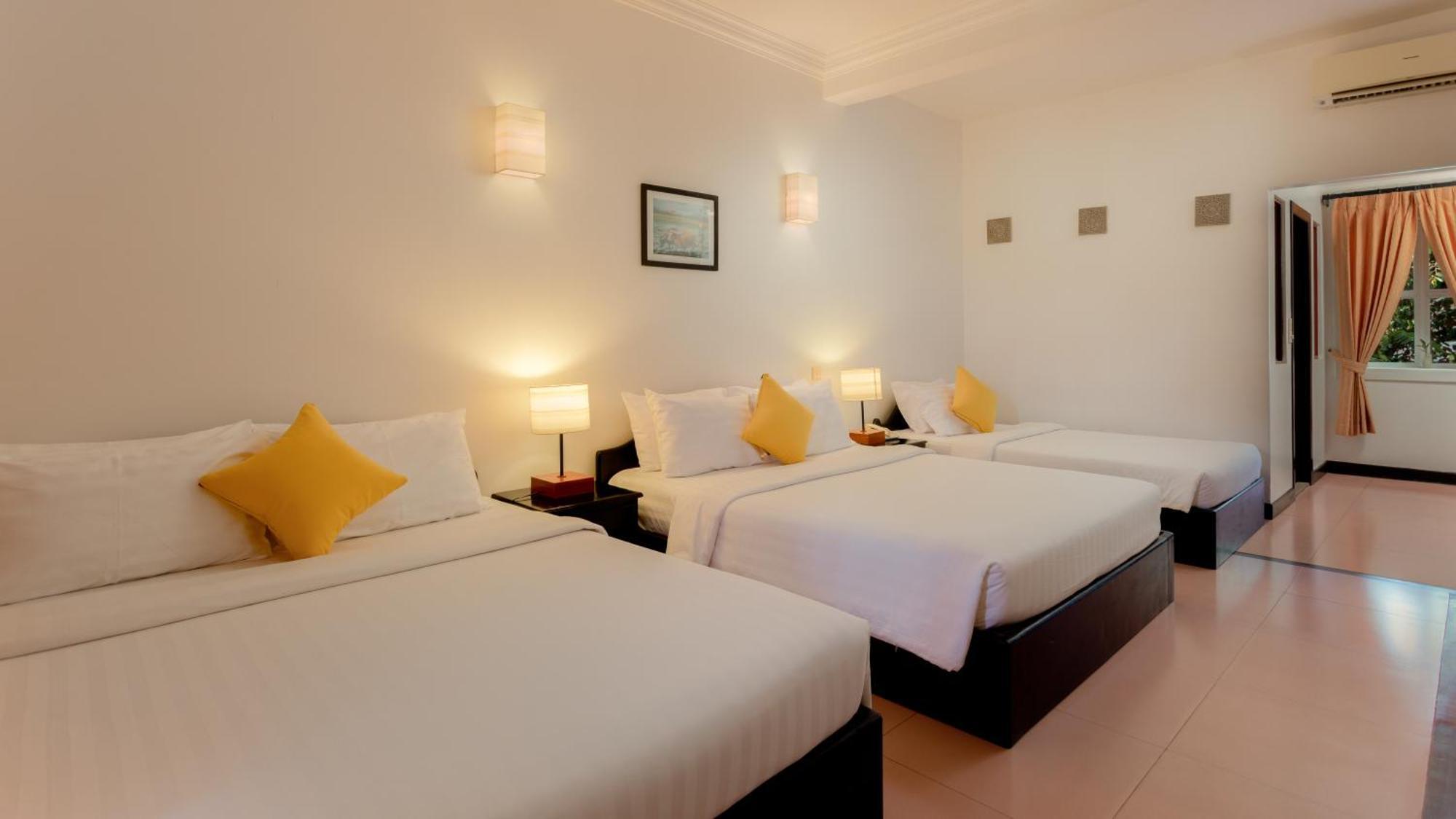 Deluxe Triple Room