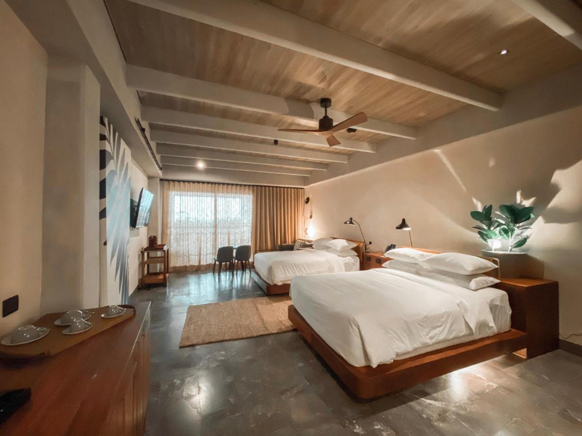 Inspira Hoeksuite met Queensize Bed - 2 Tweepersoonsbedden