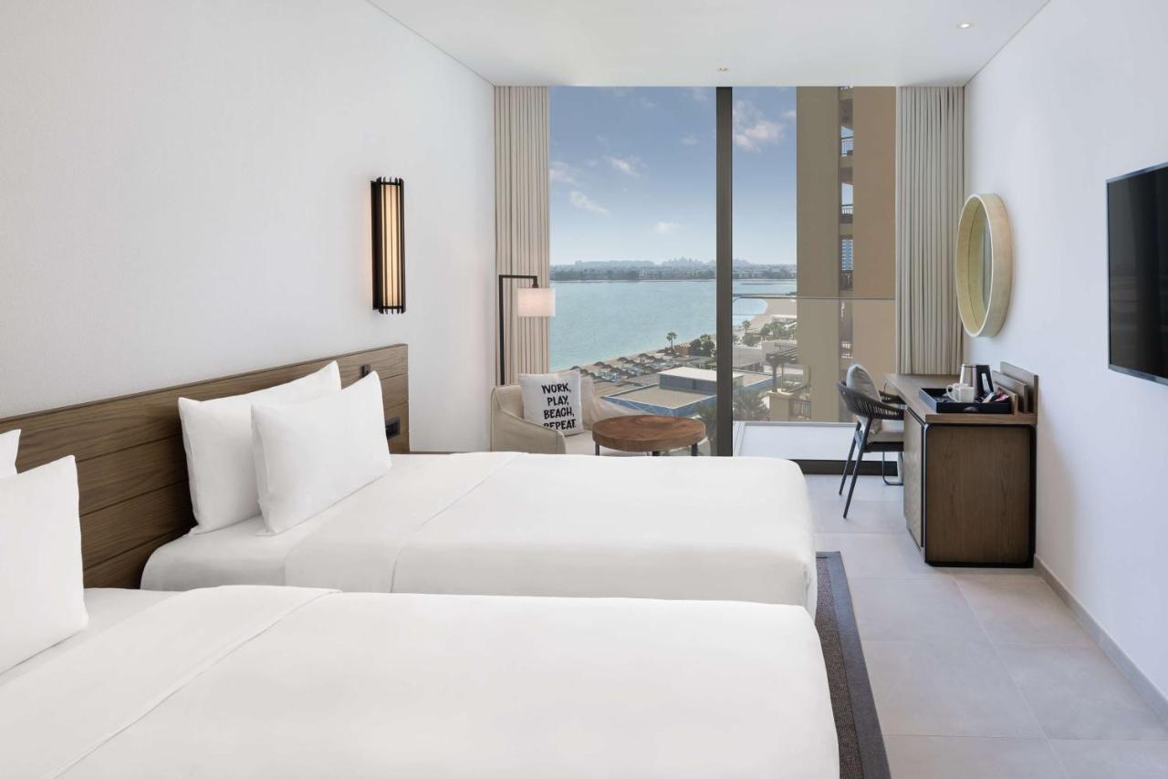 Quarto Triplo Superior com Vista Mar Parcial