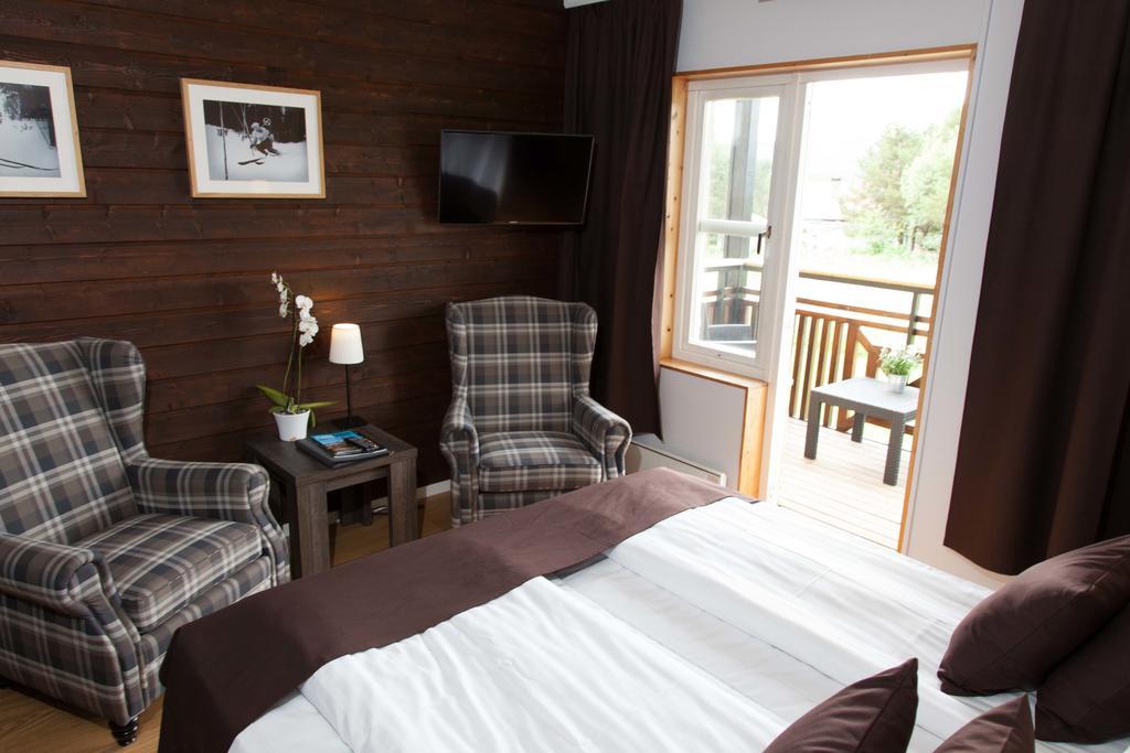 Habitación Cuádruple Premium (2 adultos + 2 niños)