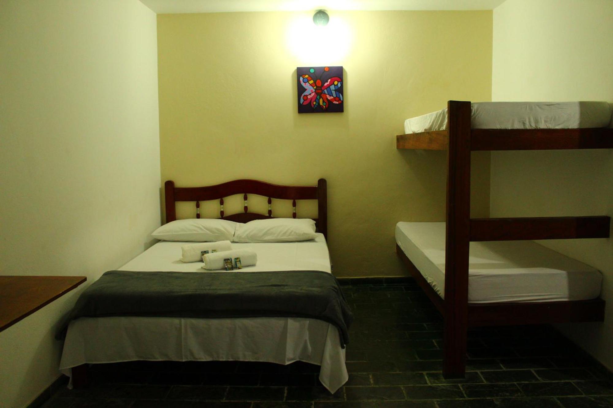 Quarto Quádruplo Premium