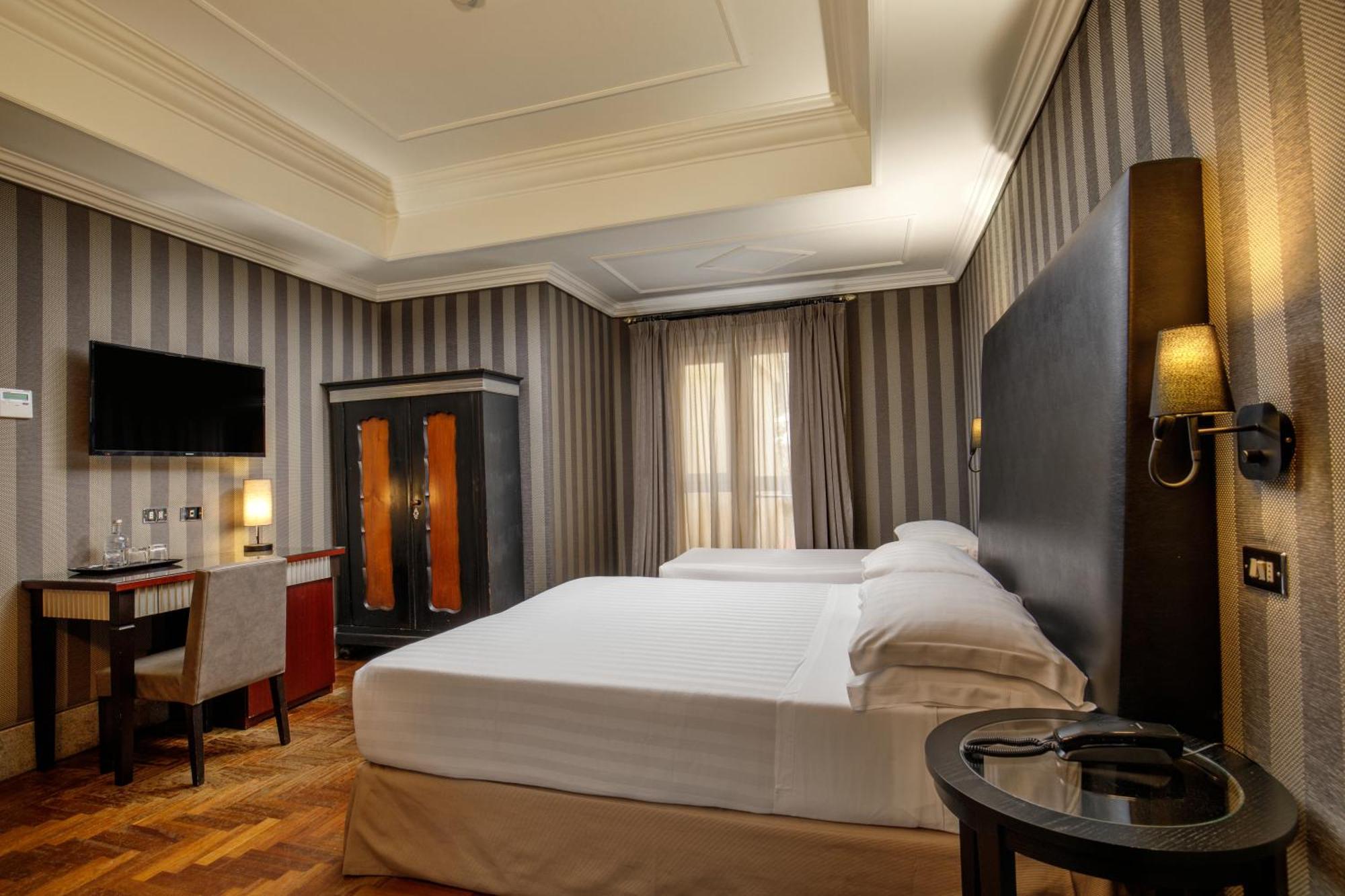 Quarto Triplo Deluxe