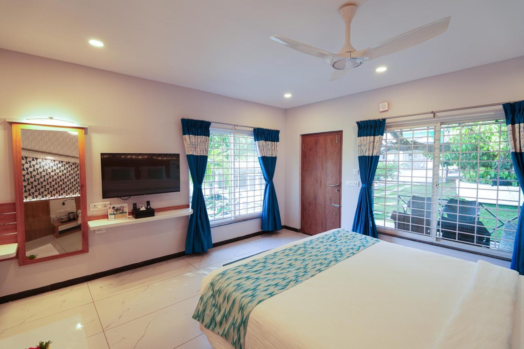 Private Cottage King Bed Pool view Sitout