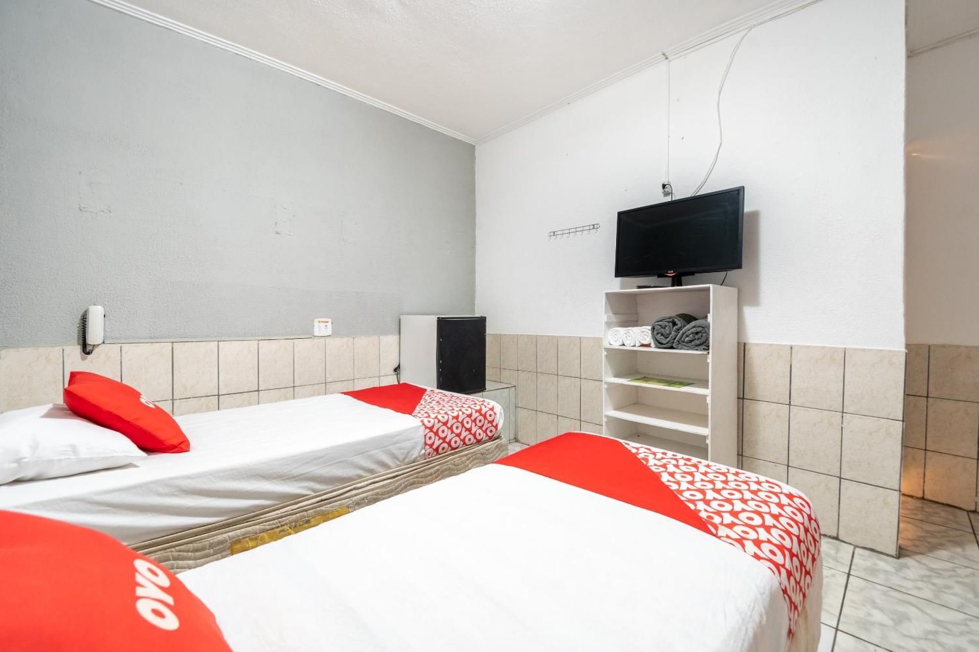 Quarto com 2 Camas de Solteiro