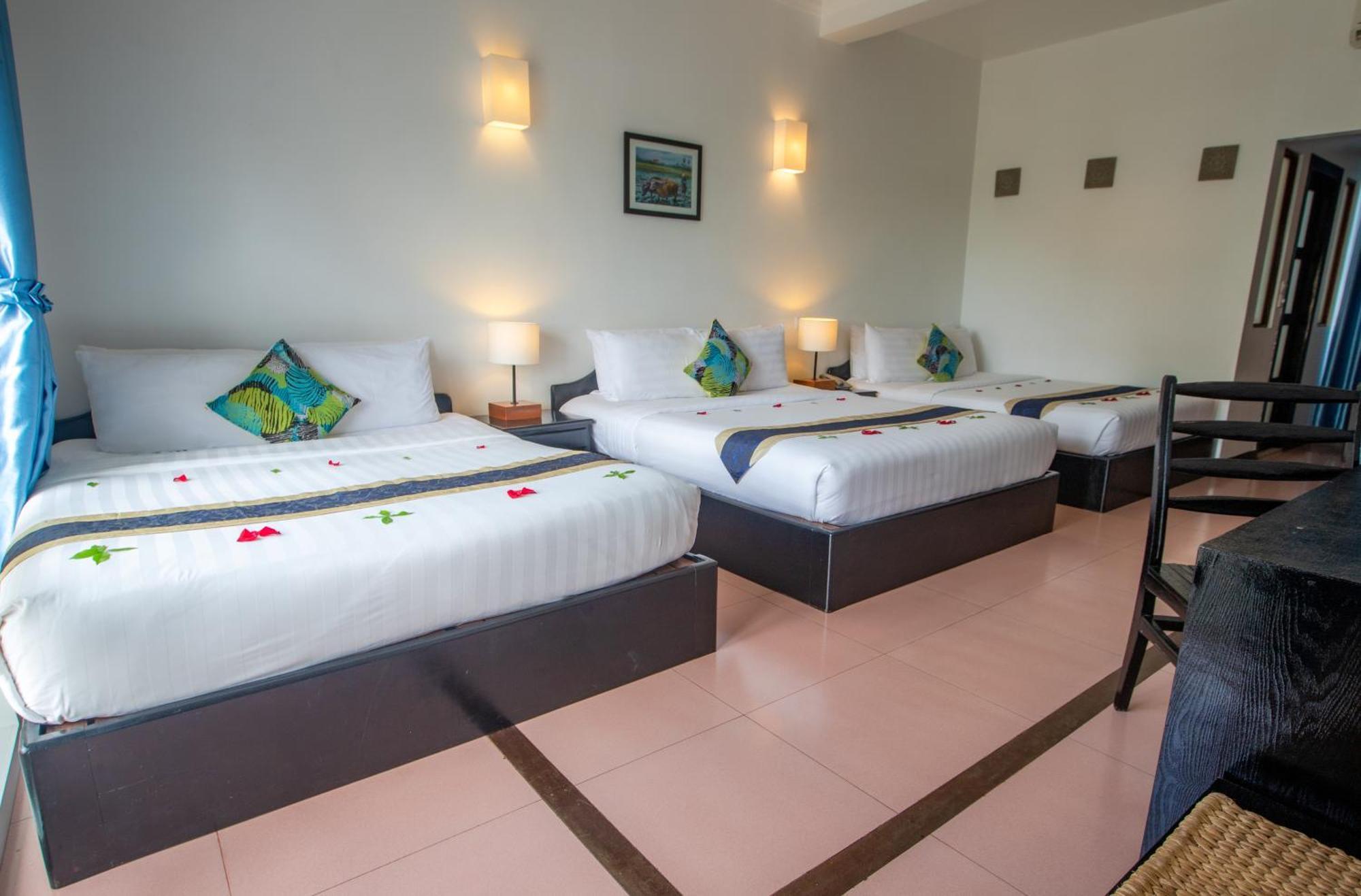 Deluxe Triple Room