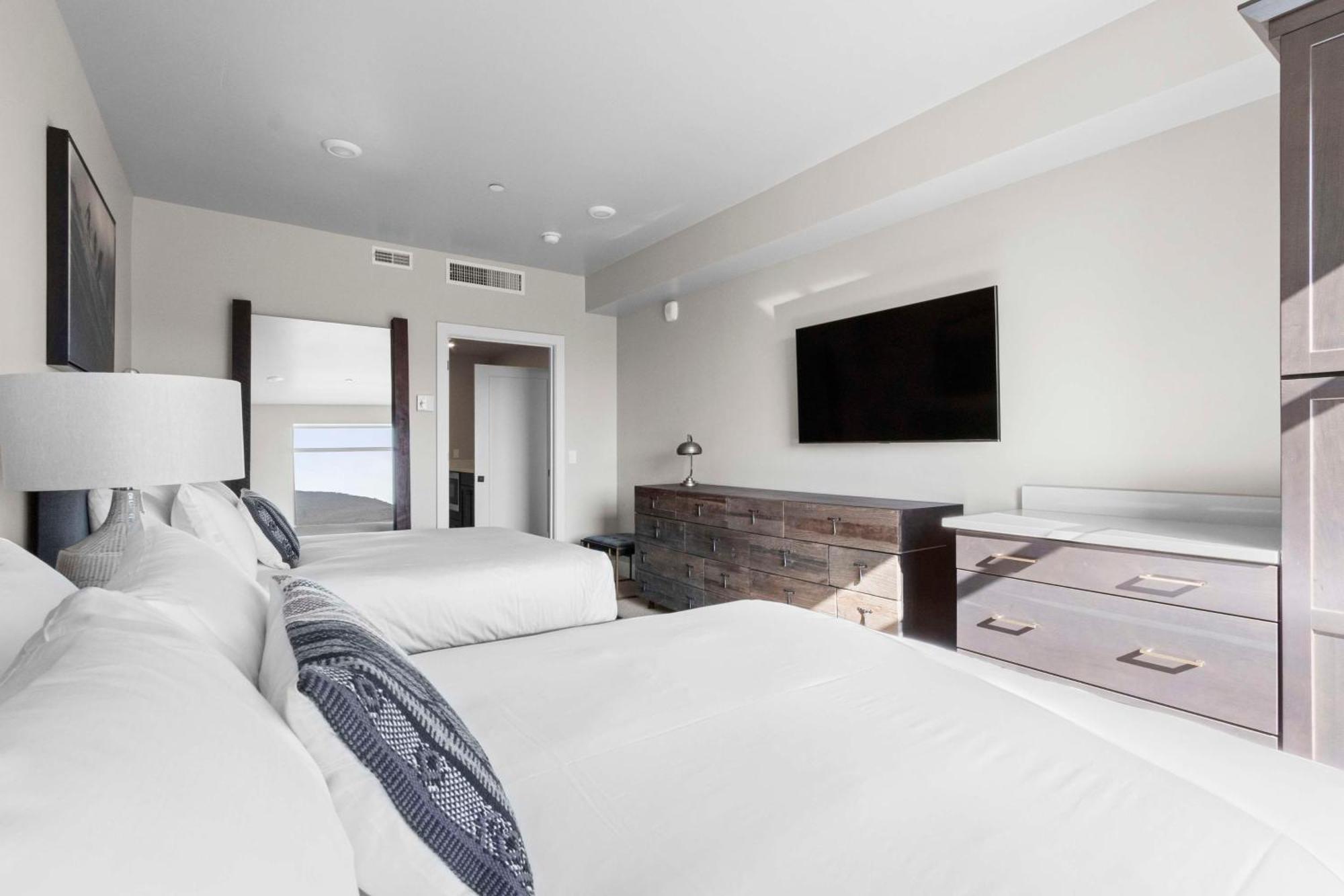 Two-Bedroom Luxury Suite - 2 Queens, 1 King, Sofa Sleeper,1743372095:JPEG