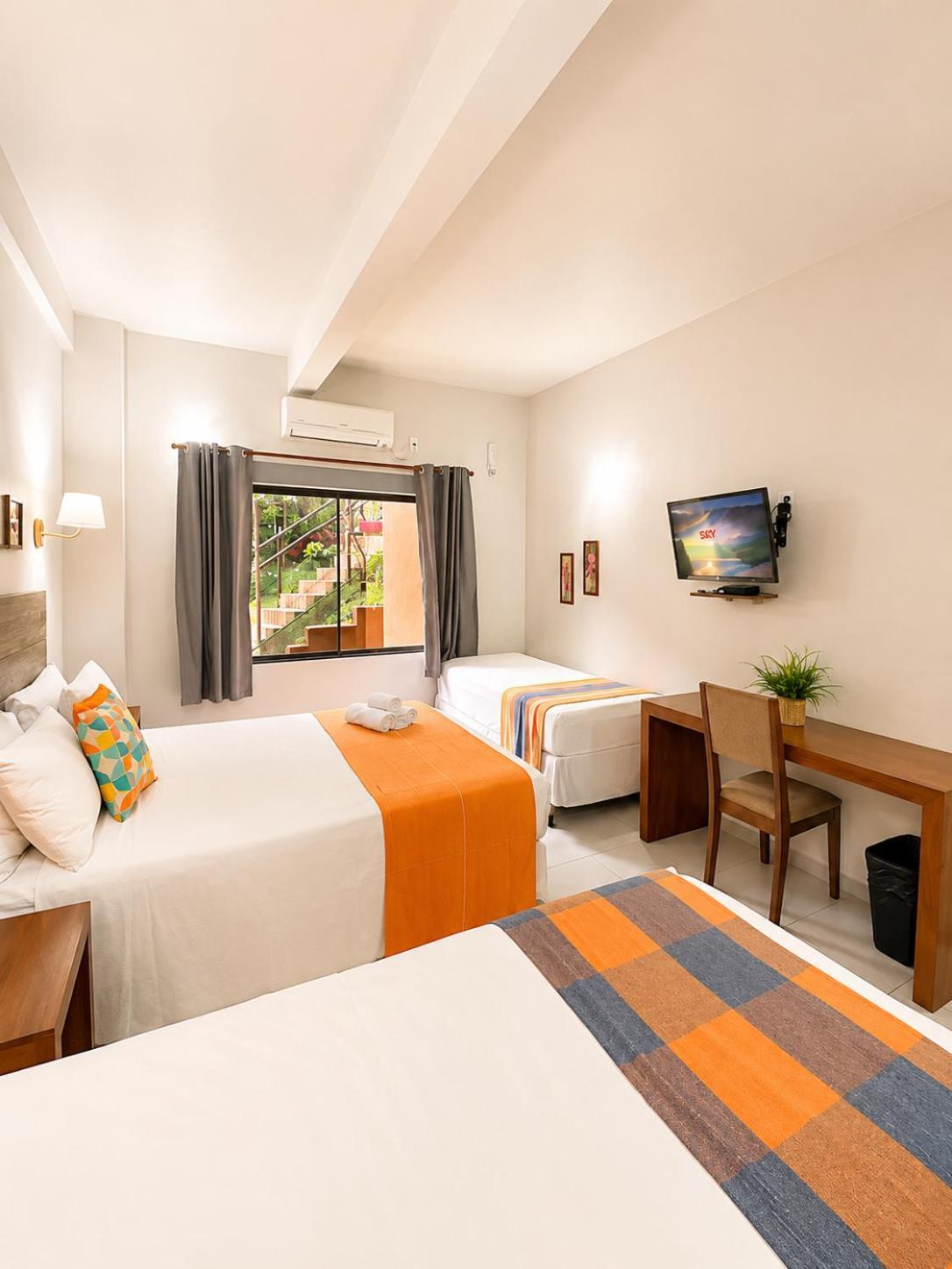 Quarto Deluxe com Cama de Casal ou 2 de Solteiro