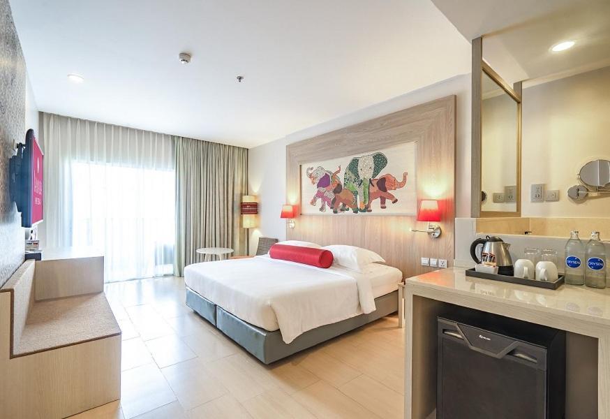 Habitación Doble Deluxe con cama extragrande y vistas a la ciudad