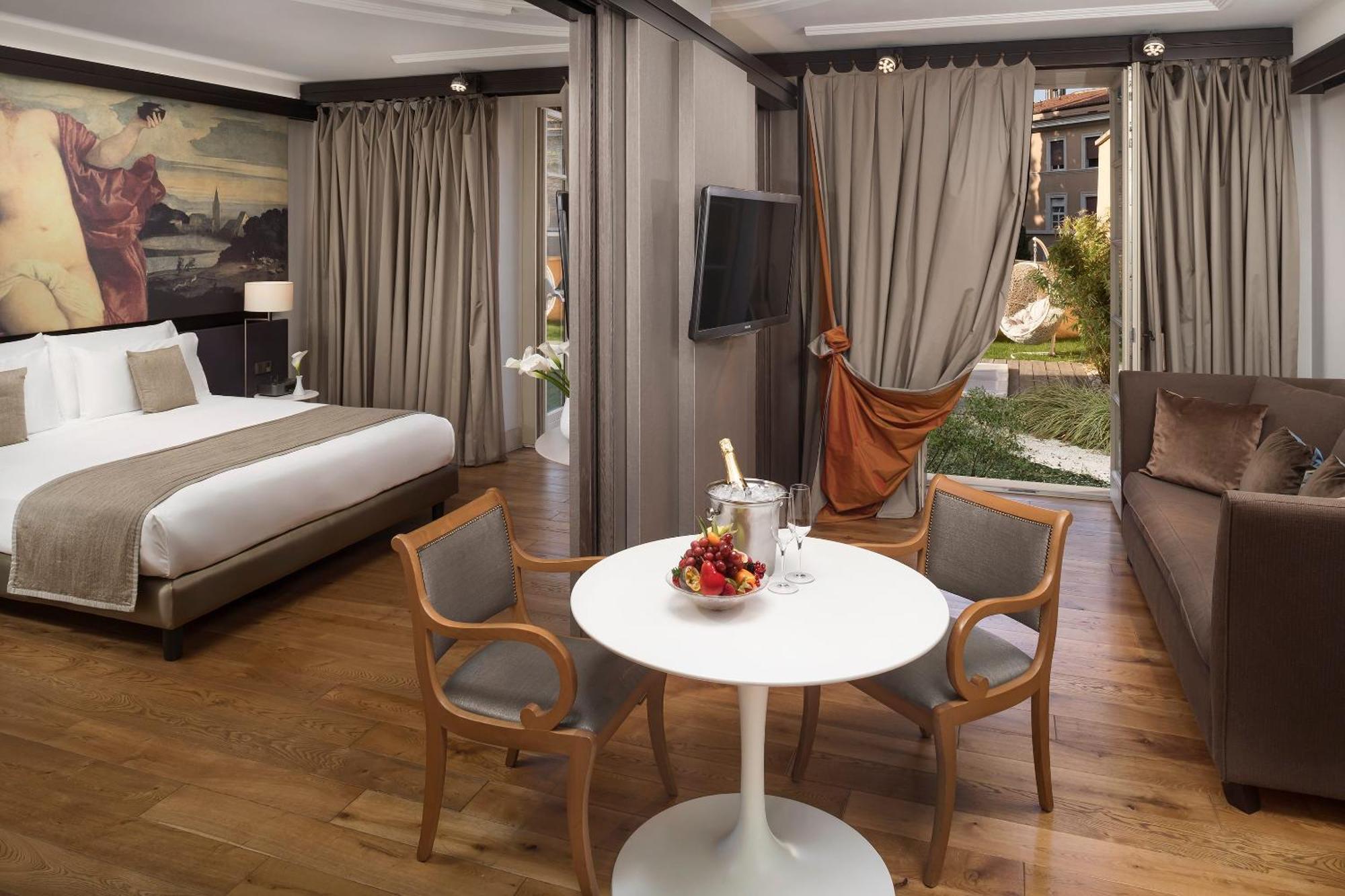 Studio Appartement met tuin, hydromassagebad en toegang tot de spa
