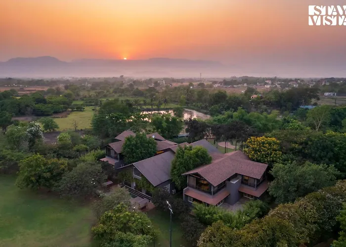 Vacation rental: Nivaant Farms By Stayvista - Green Retreat With Pool, Orchard, Jacuzzi & Gazebo